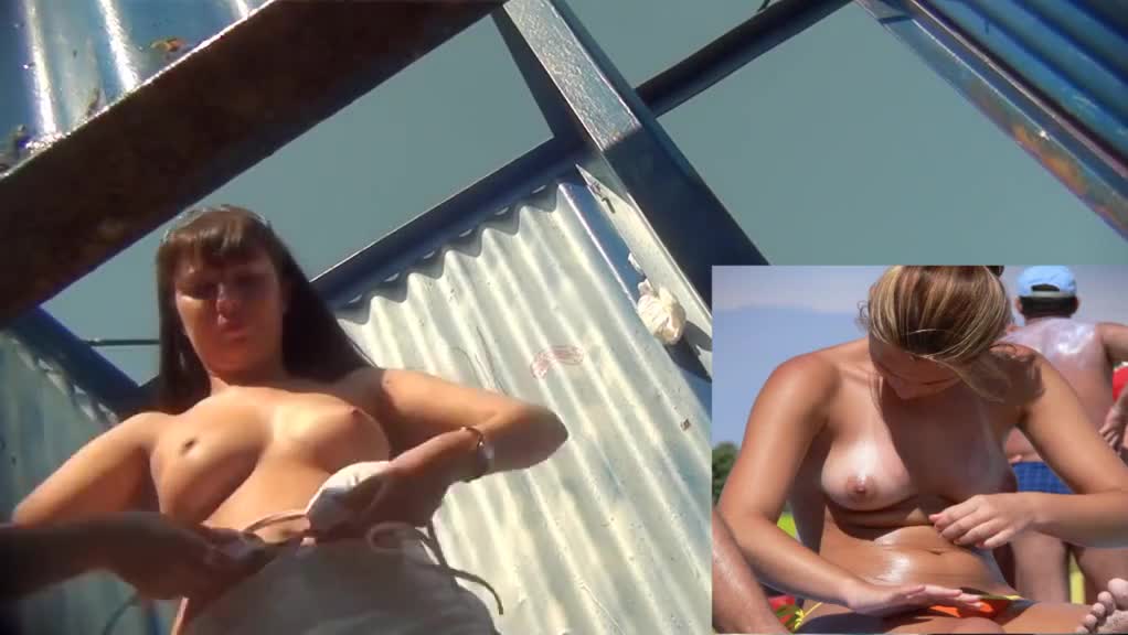 Changing into her swimming suit - Videos
